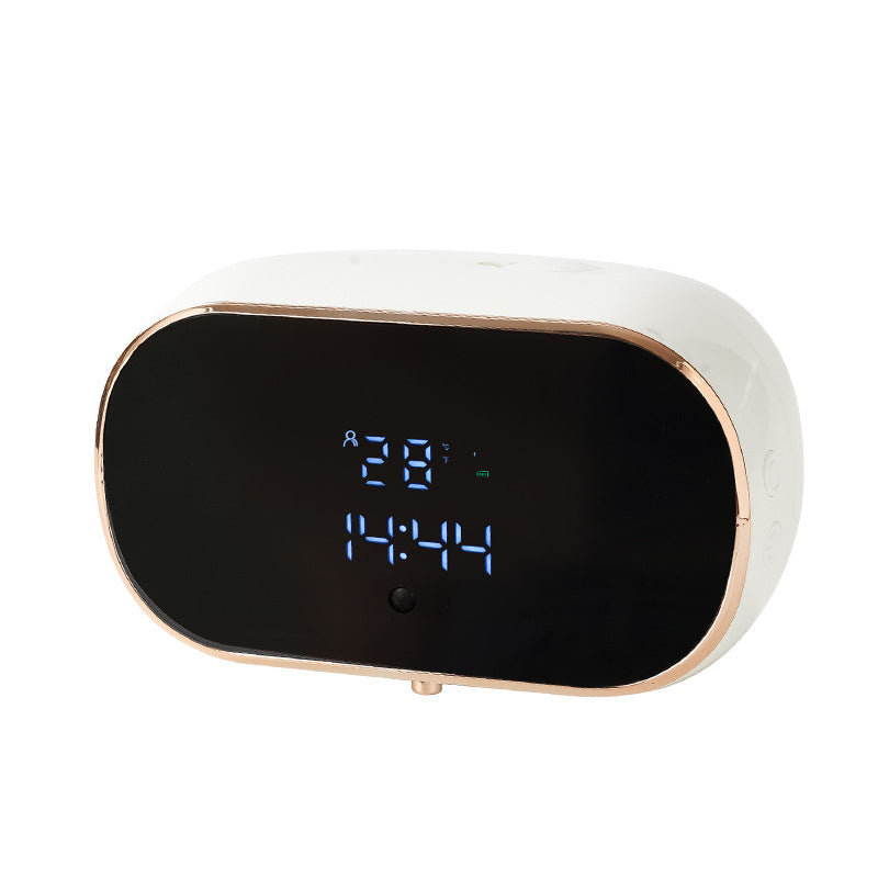 Witte automatische zeepdispenser met zwart display en blauwe cijfers op witte achtergrond.